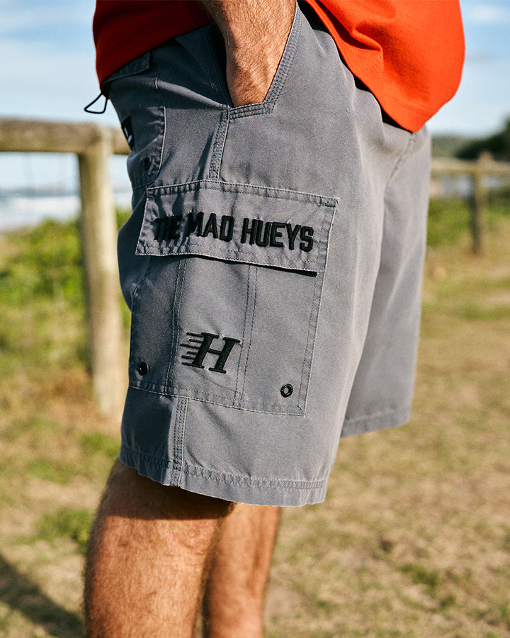 The Mad Hueys Beached Again 20" Boardshort in Petrol Blue Washed, lifestyle view