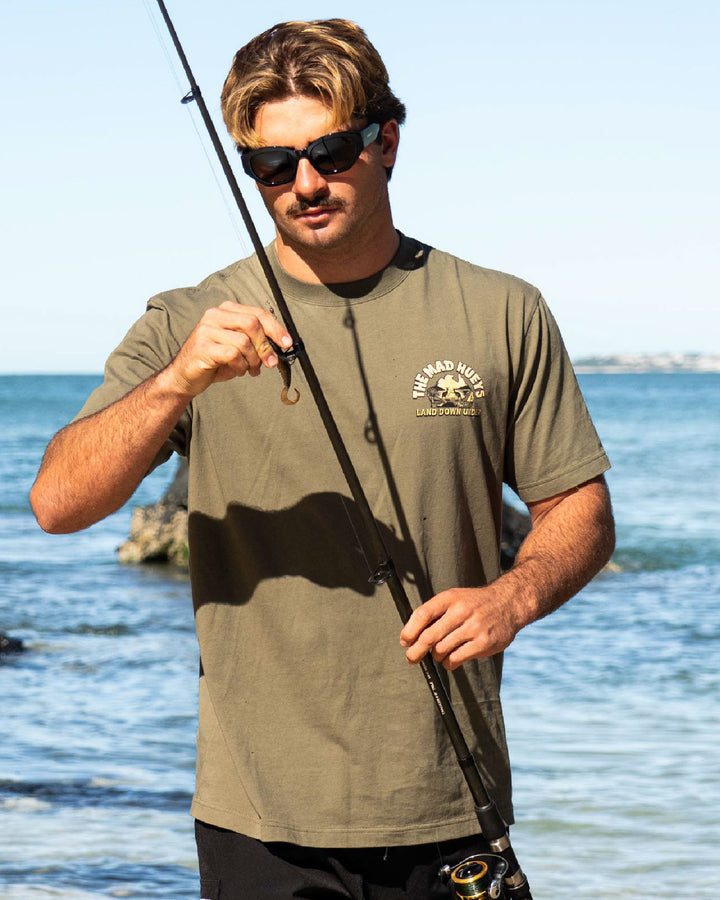 The Mad Hueys Land Down Under SS T-shirt in Olive, lifestyle view