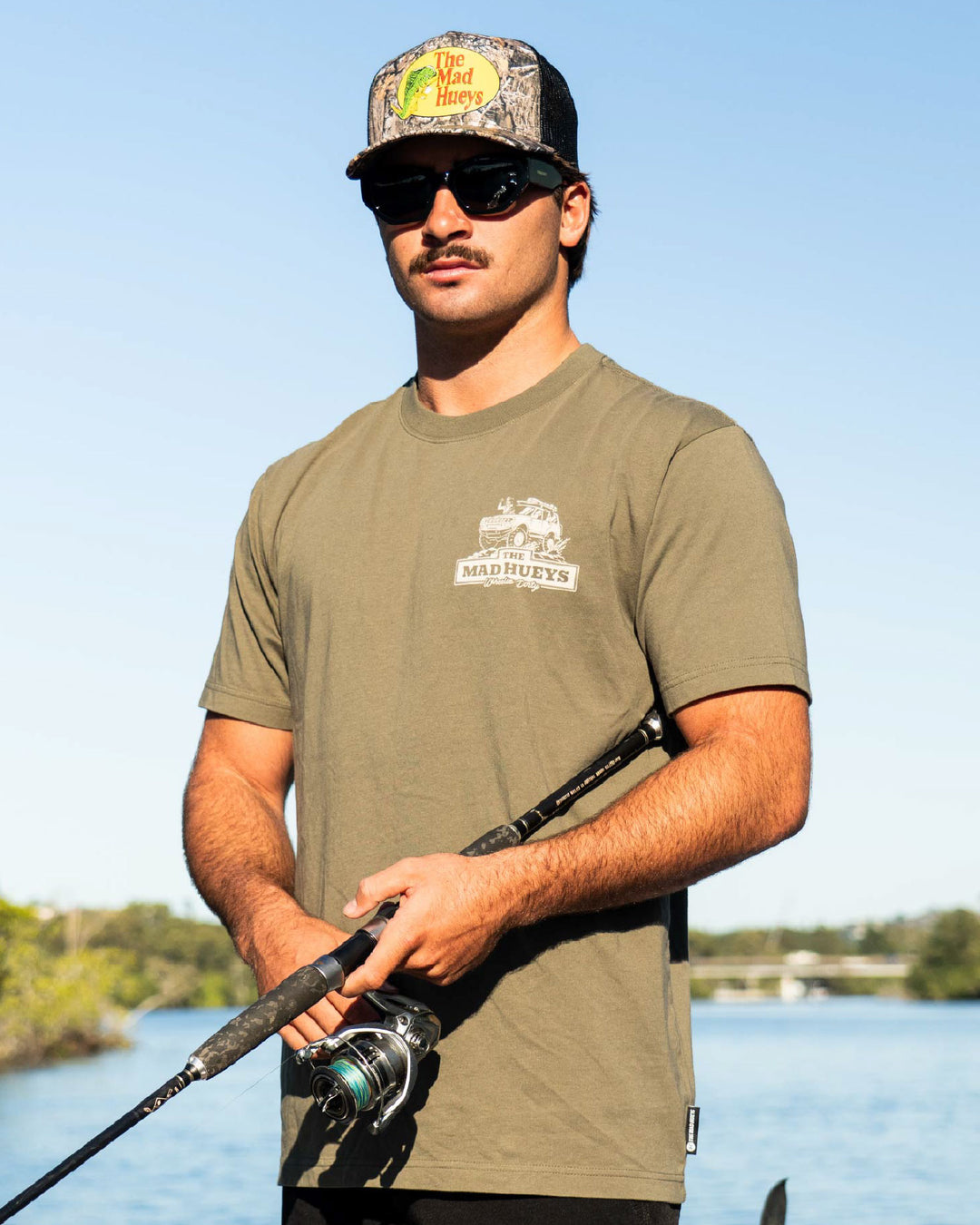The Mad Hueys Wheelie Dirty SS T-shirt in Olive, lifestyle view